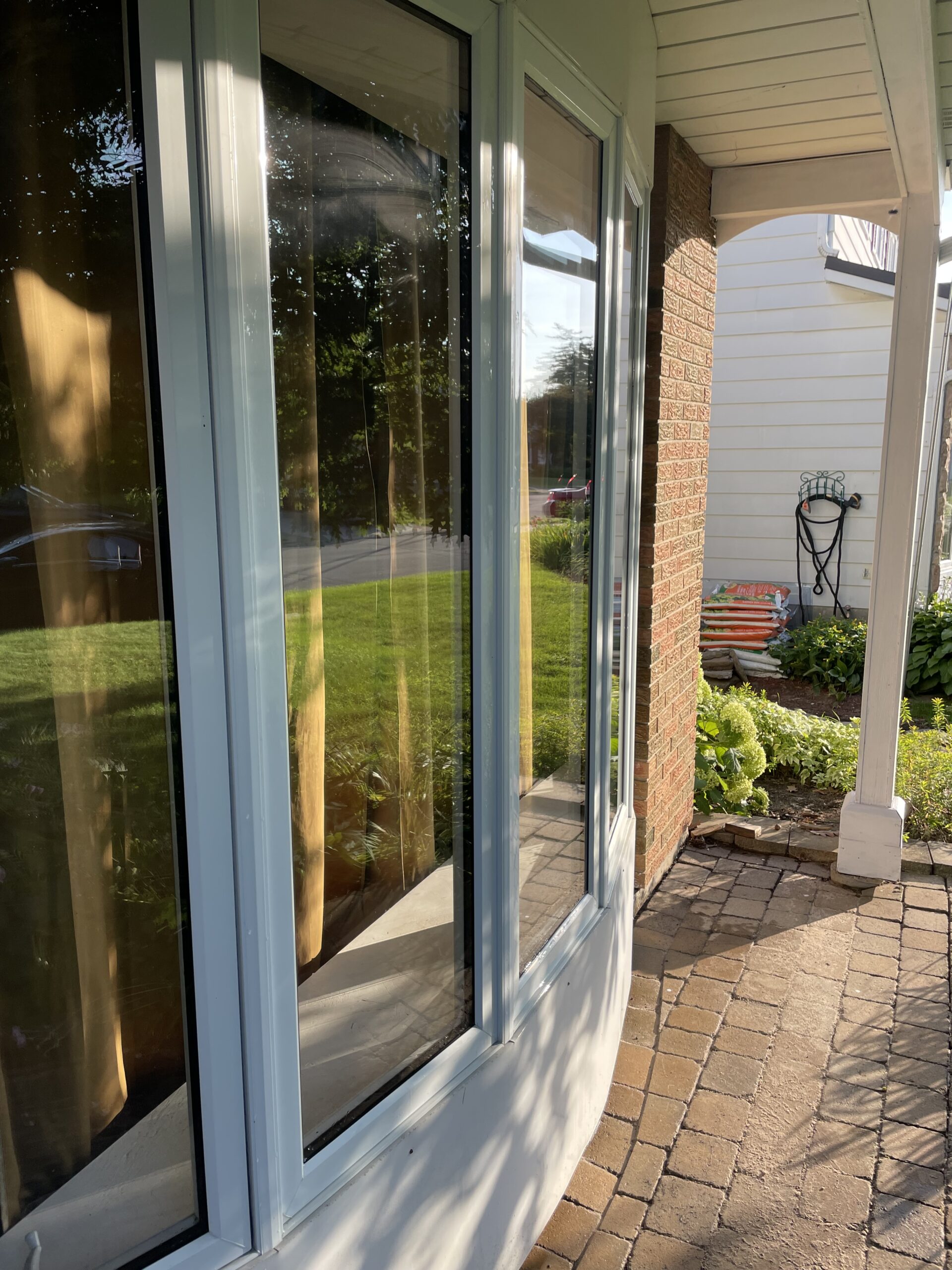 Professional window cleaning service on residential glass in Ottawa